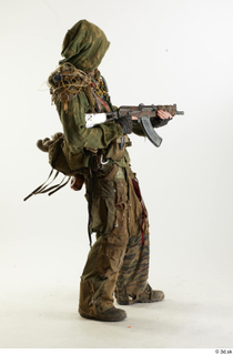 Photos John Hopkins Army Postapocalyptic Suit Poses aiming the gun…